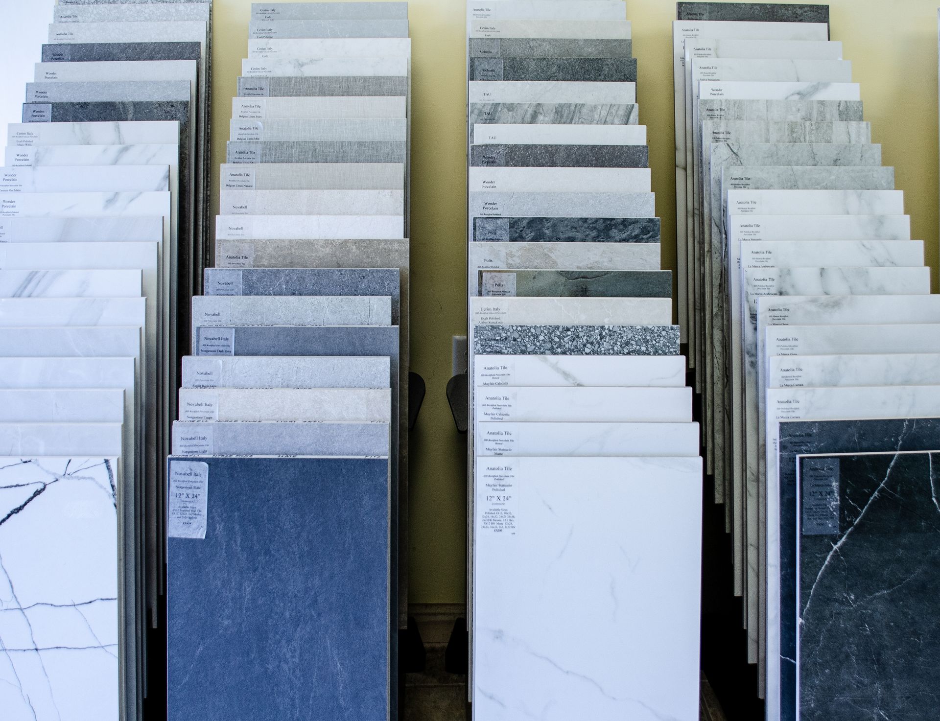 a bunch of tiles are stacked on top of each other