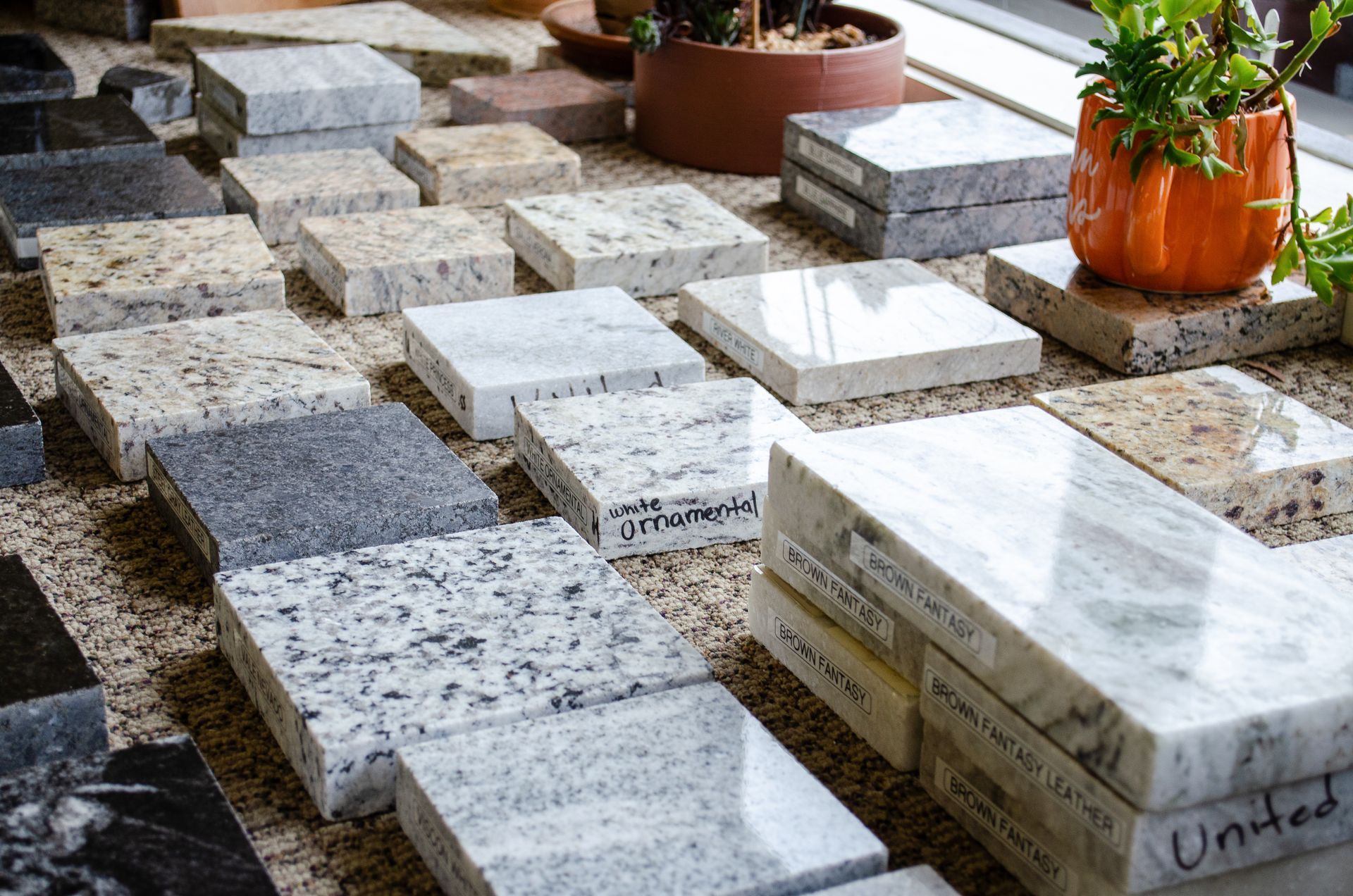 there are many different types of granite tiles on the floor