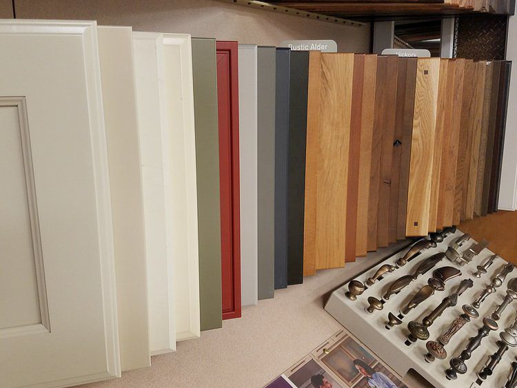 a display of different types of cabinet doors and handles