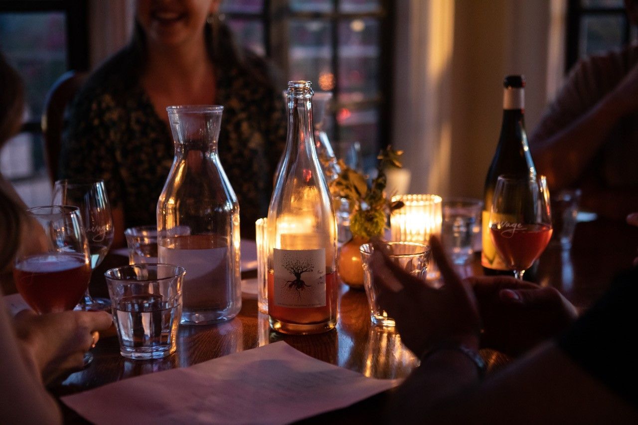 wine and candles on a table