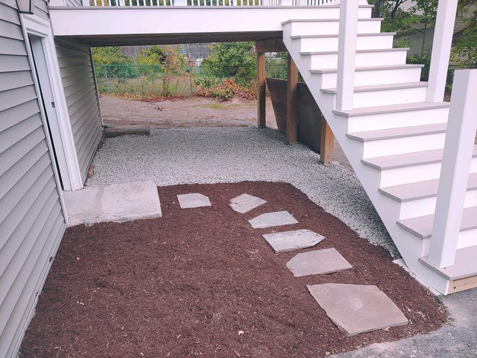 A house with stairs leading up to the second floor