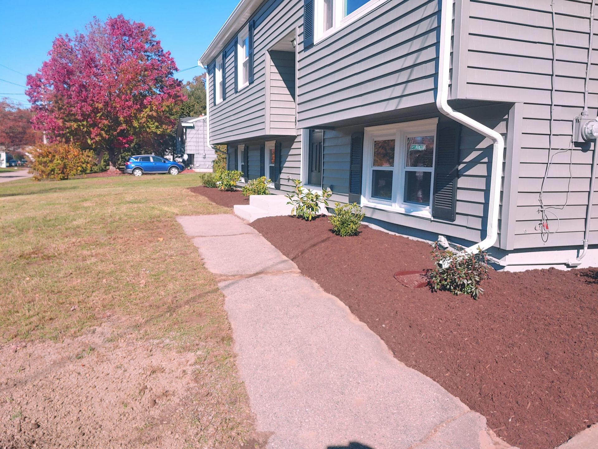 A building with a sidewalk leading to it