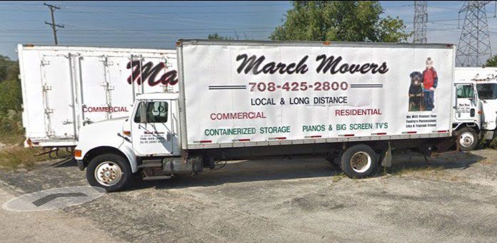 A white box truck for March Movers, featuring the company phone number, services, and logo parked on an asphalt lot.