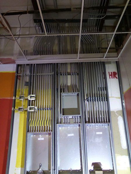 A building under construction with the word hr on the wall