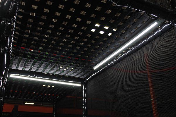 A ceiling with a bunch of lights on it