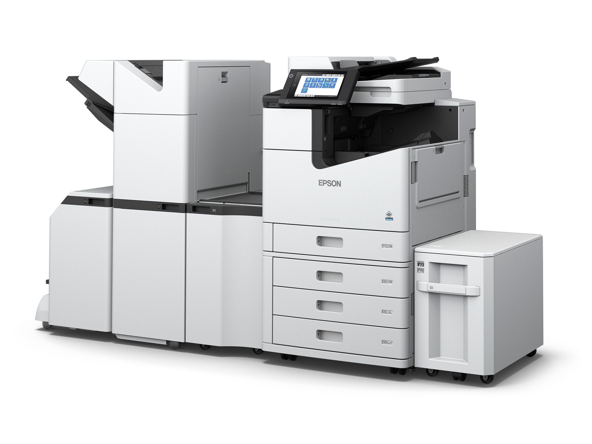 A large white printer is sitting on top of a white table.