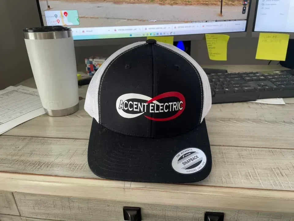 A black and white trucker hat with an 