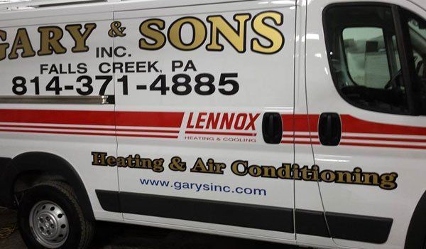 A white van with lennox heating and air conditioning written on it