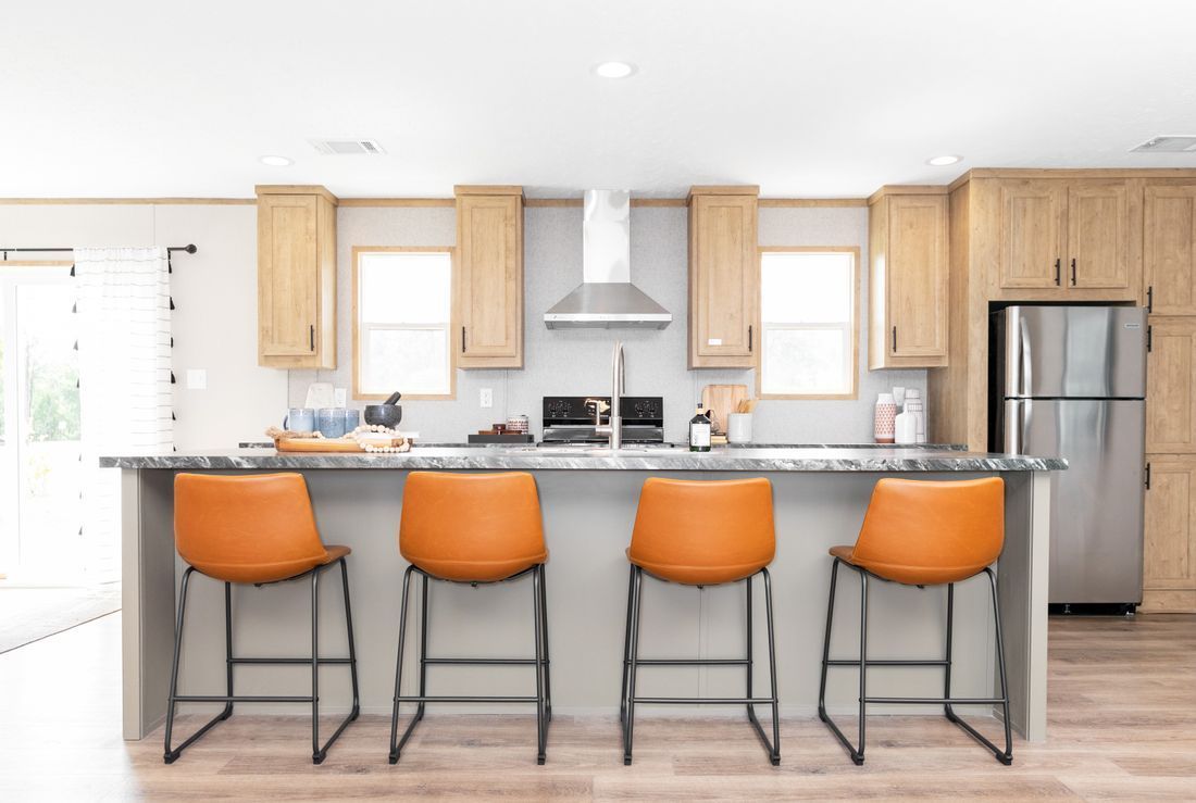 a kitchen with a large island