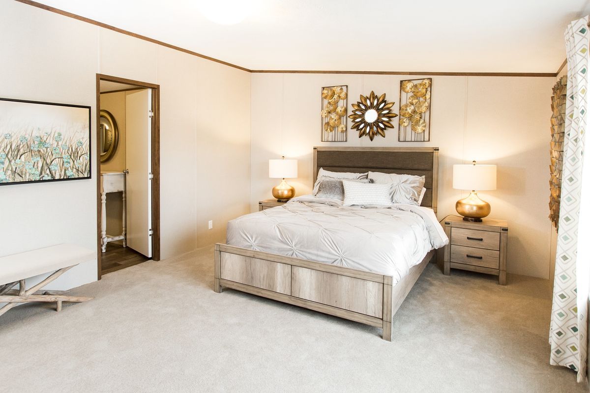 there is a large bed in the middle of the room