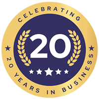 A circular gold and navy emblem featuring the text 