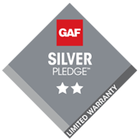 A grey diamond-shaped GAF Silver Pledge Limited Warranty logo with a red GAF square and two white stars.