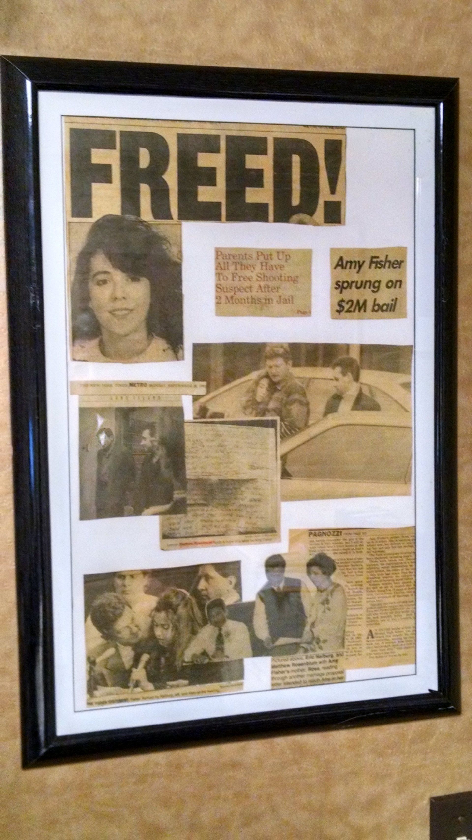 Newspaper cutout on wall