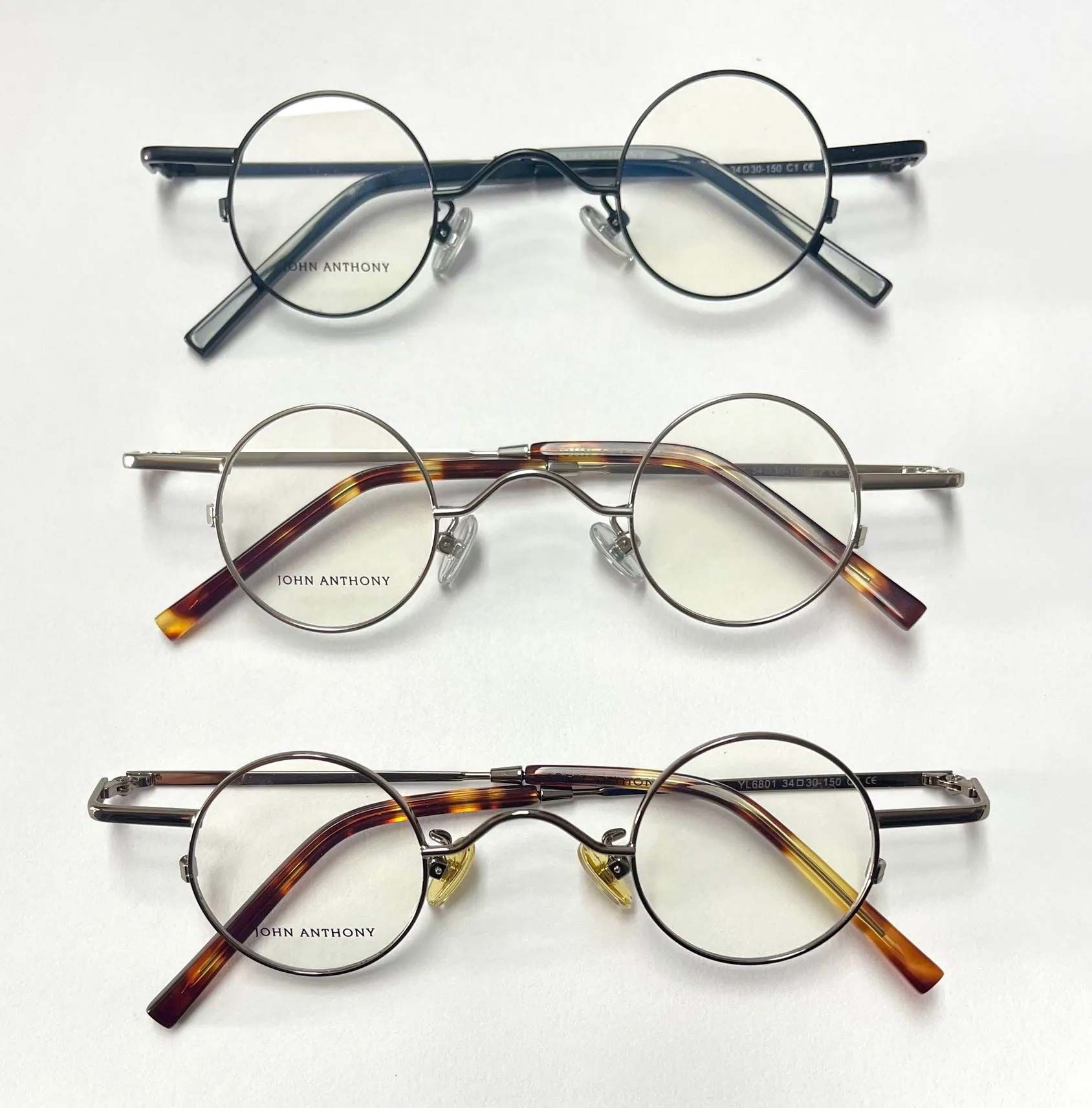 Three pairs of eyeglasses with rounded frames