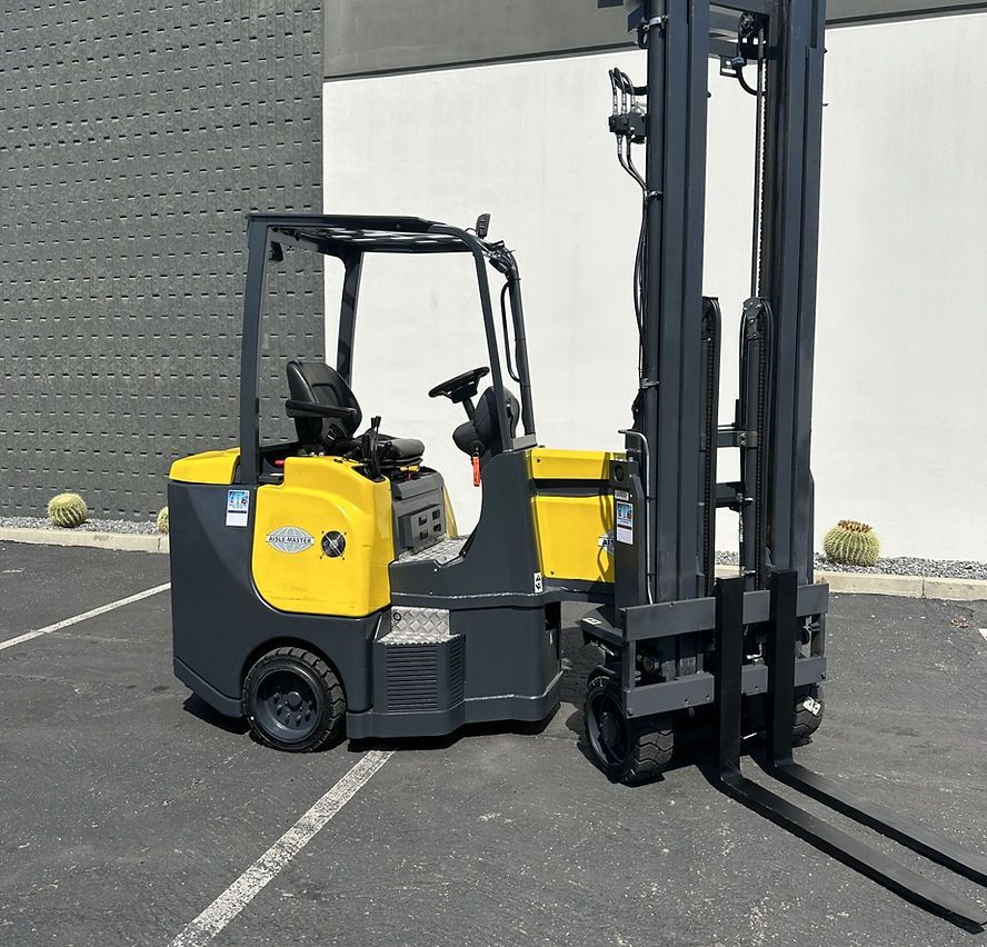 A yellow and black forklift is parked in a parking lot
