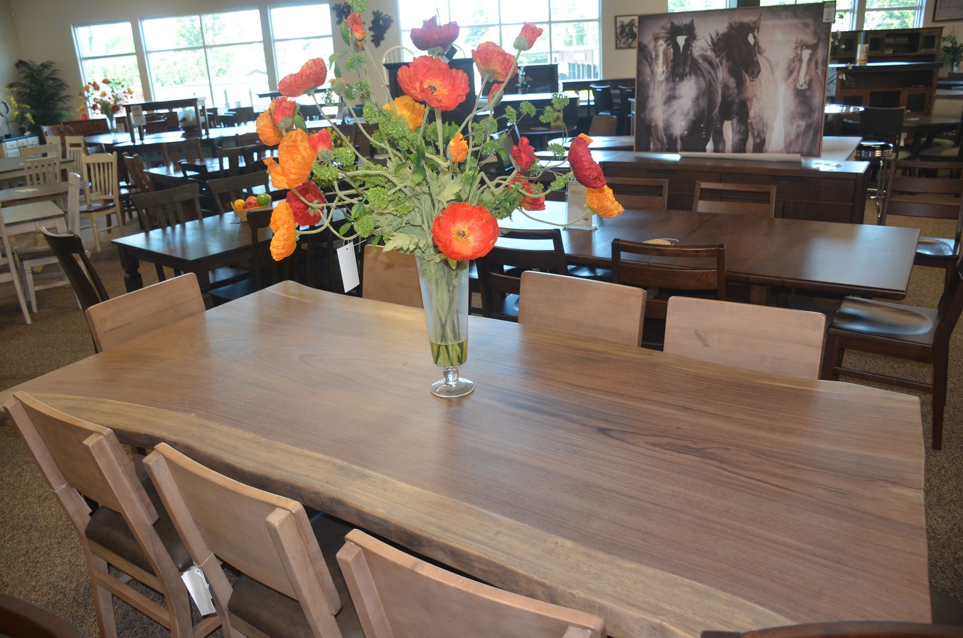 A table with a vase of flowers on it