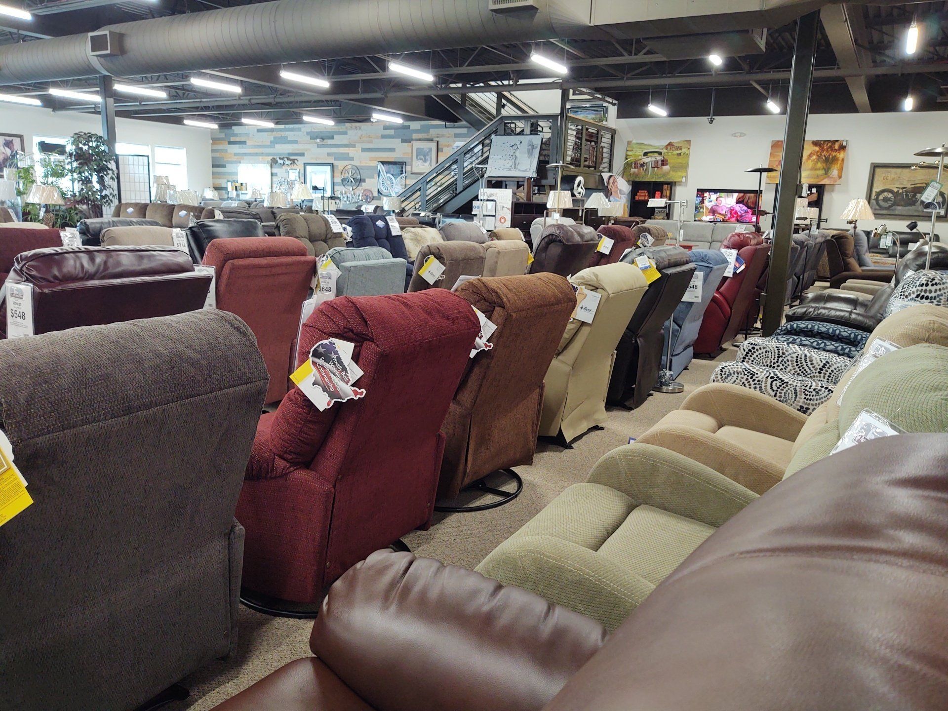 A large room filled with lots of recliner chairs
