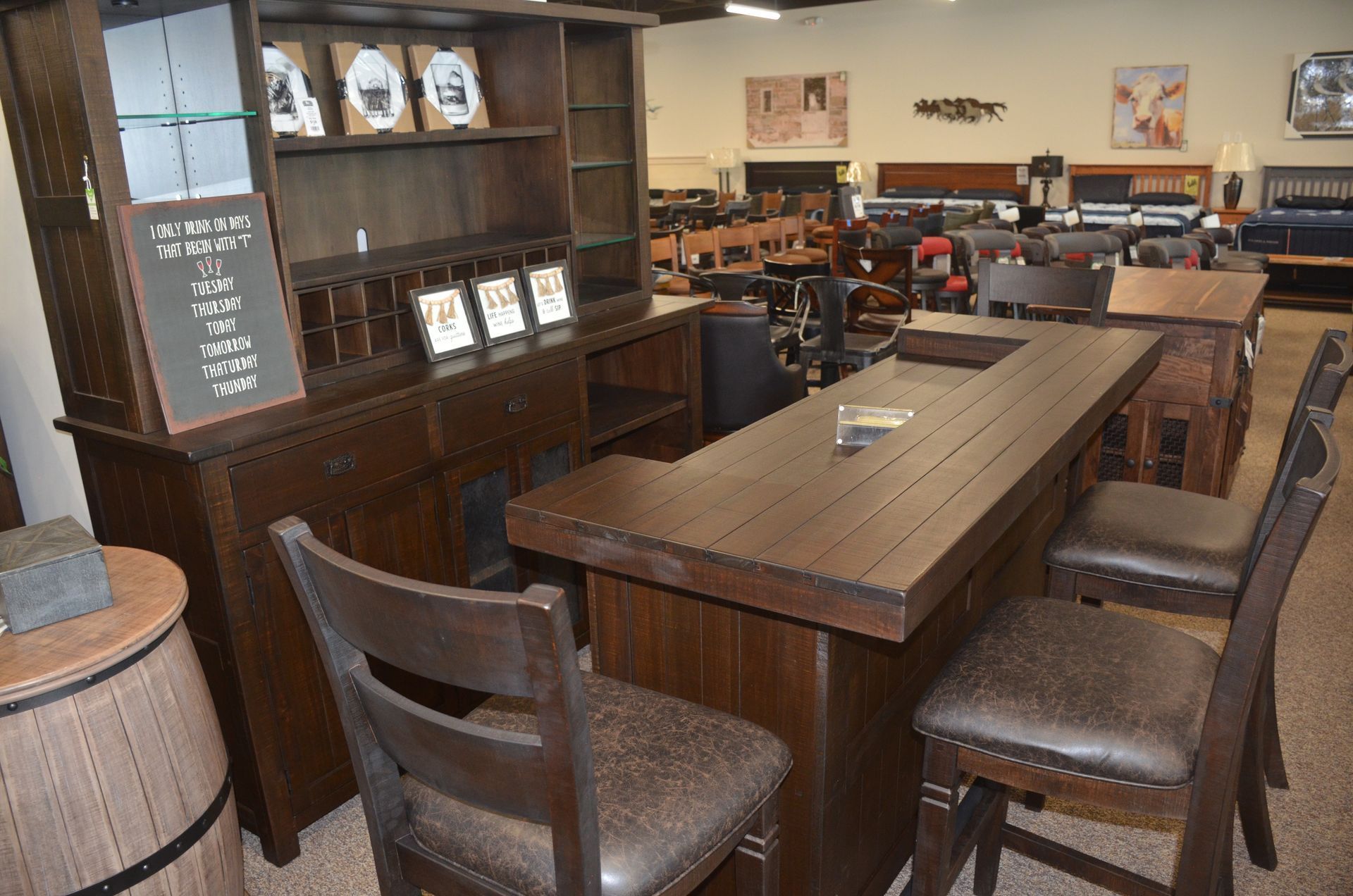 A room with a table and chairs in it