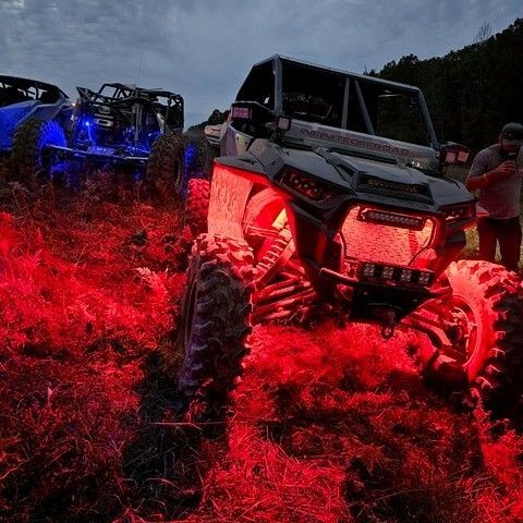 An ATV with red lights on it