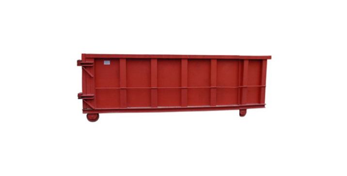 Red rectangular dumpster with metal sides, wheels, and top ledge, outdoors.