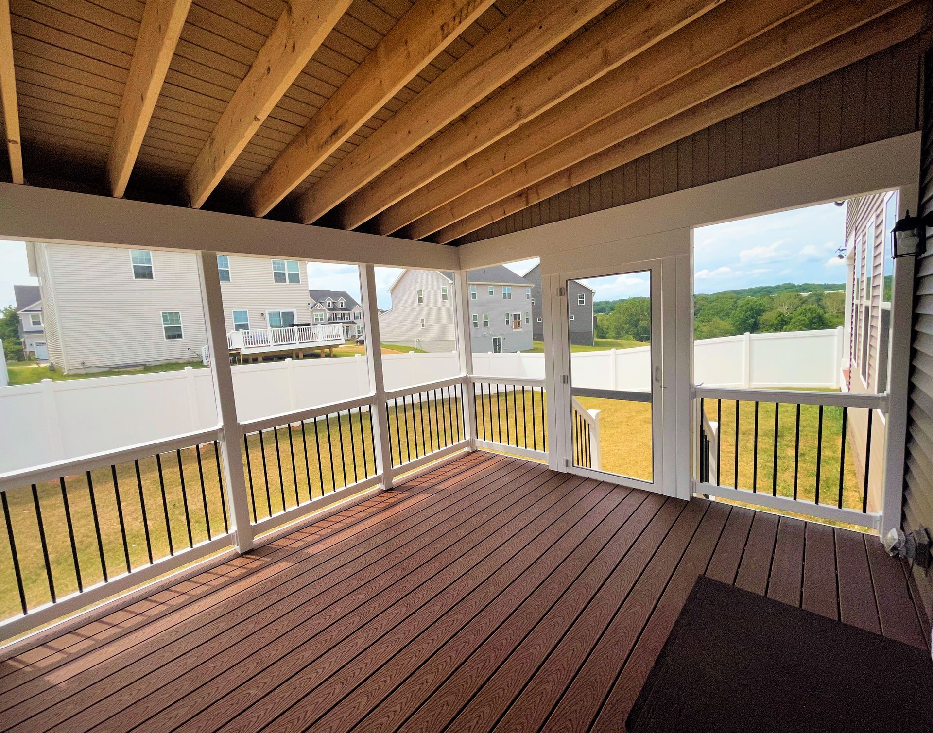Screened in porch in wooden deck