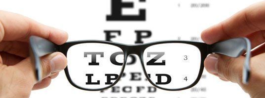 Eyeglasses and an eye chart