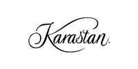 The black logo of the rug manufacturer Karastan in a decorative script font against a white background.