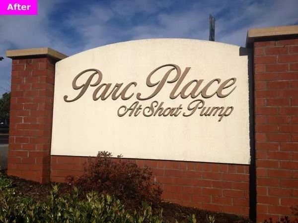 Parc Place at Short Pump sign on a brick wall under a blue sky