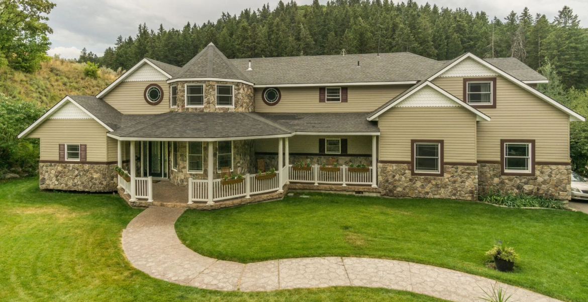 A large house with a walkway leading to it