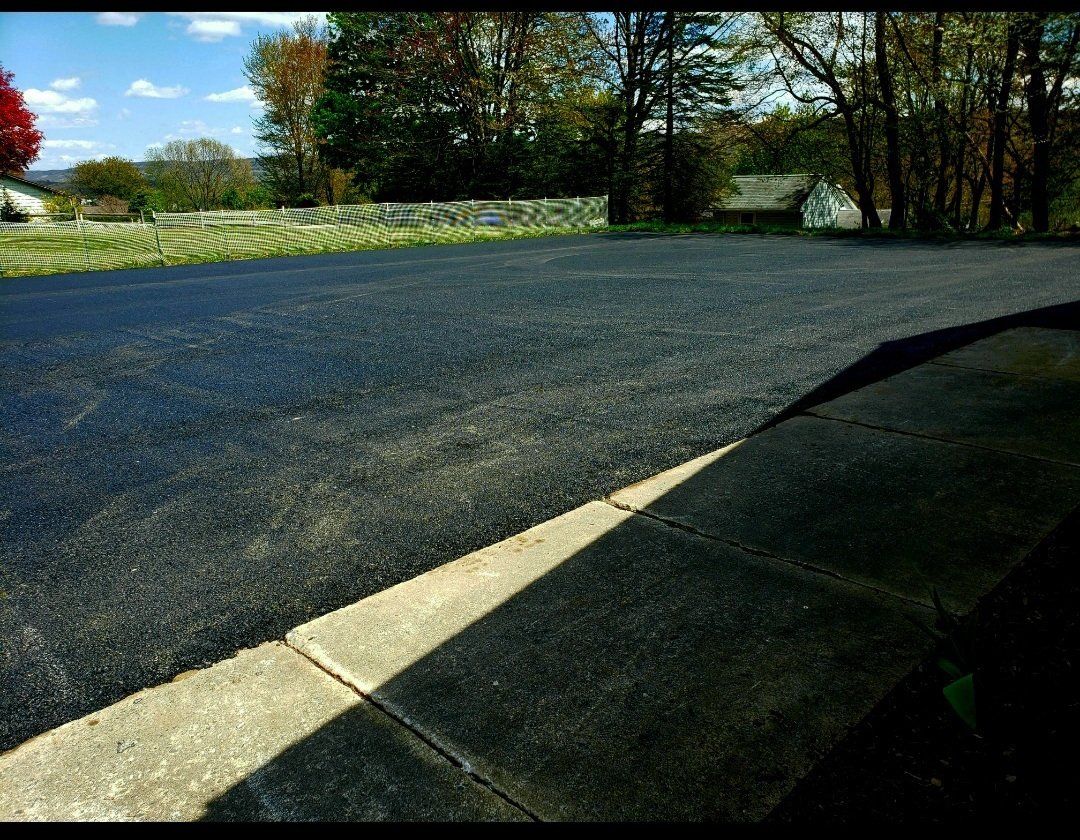 Paving and Sealcoating Work