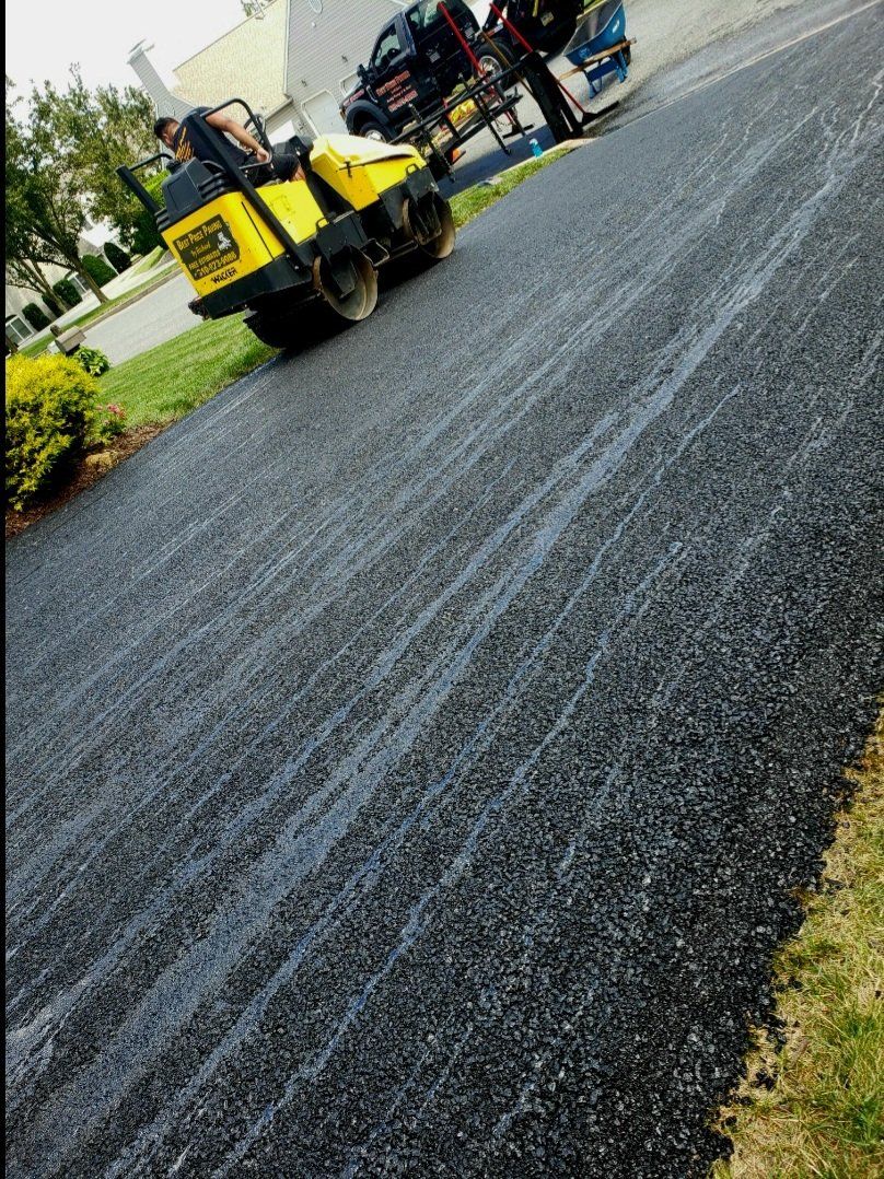 Paving and Sealcoating Work
