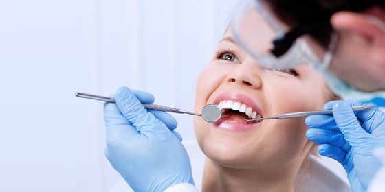 Woman having dental check up