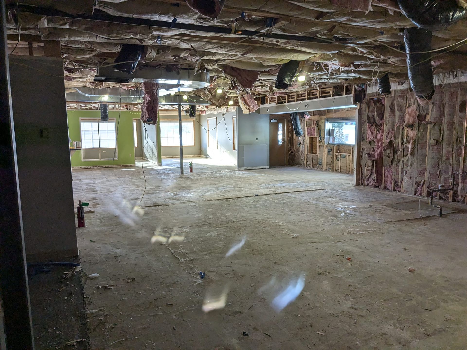 An empty room with a lot of insulation on the ceiling