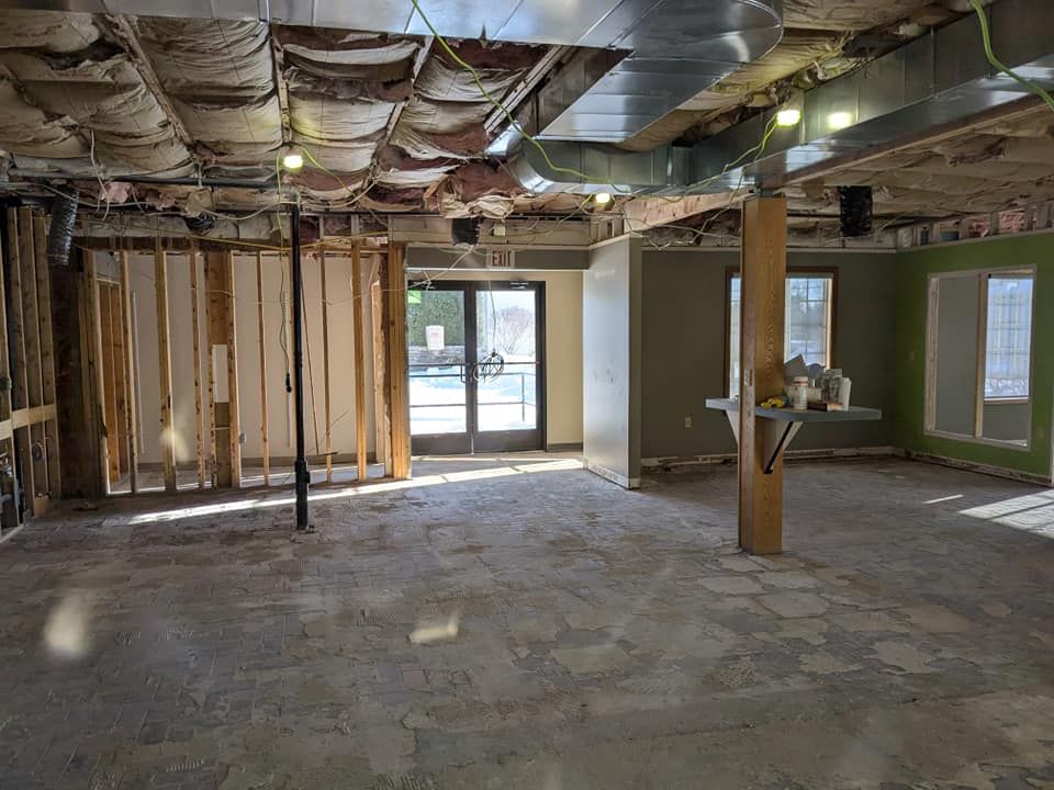 An empty room with a ceiling that is being remodeled.