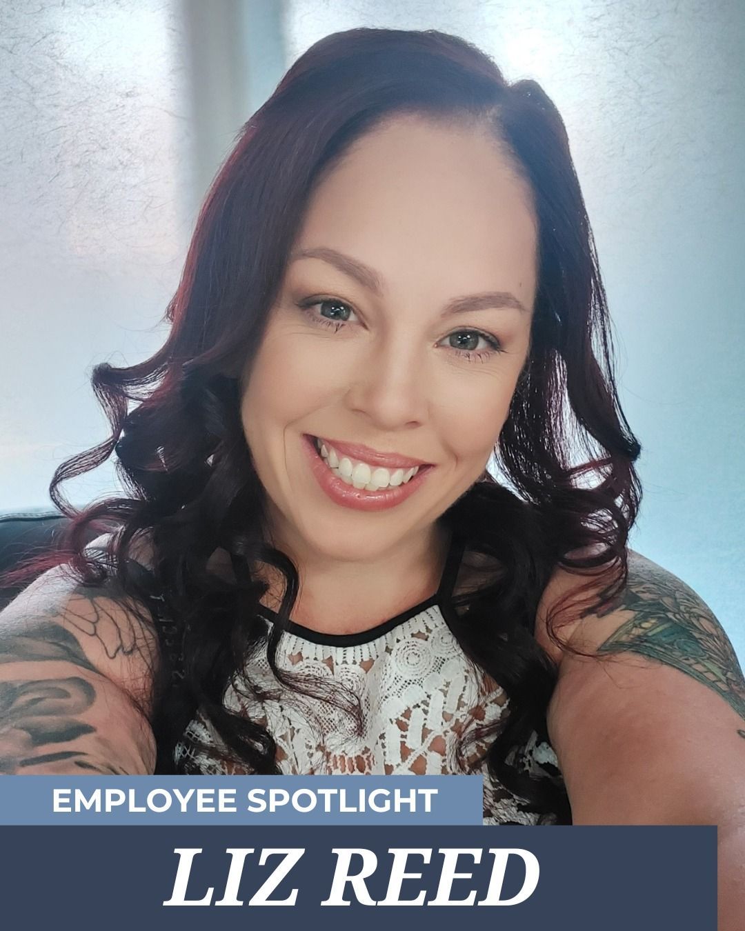 Employee spotlight graphic featuring a smiling person with dark hair and tattoos, identified by the text LIZ REED. 