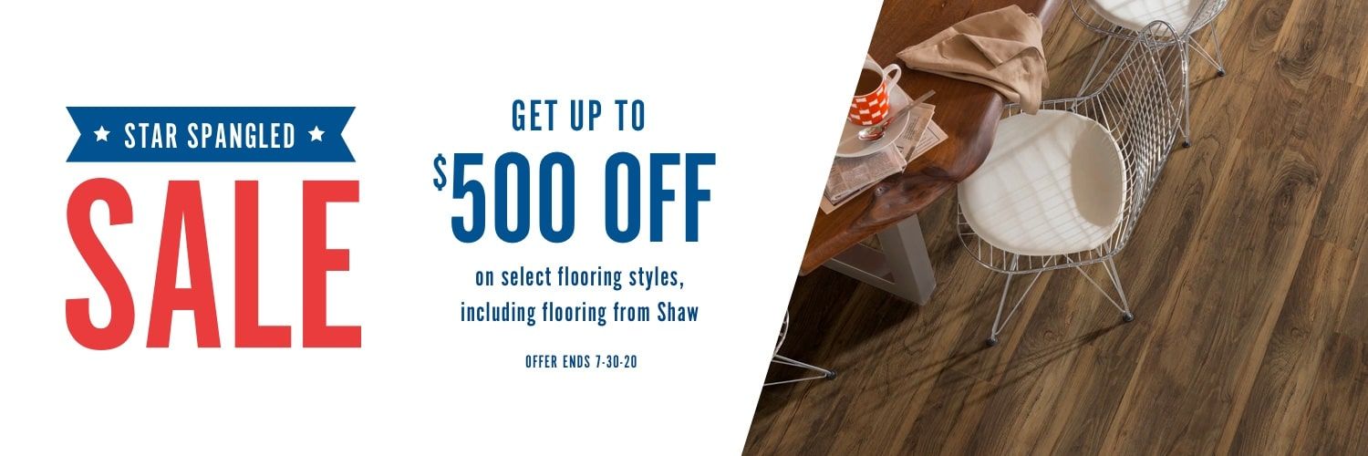 Sale banner with “Star Spanker SALE” and “Get up to $500 off” over a wood floor with a chair.
