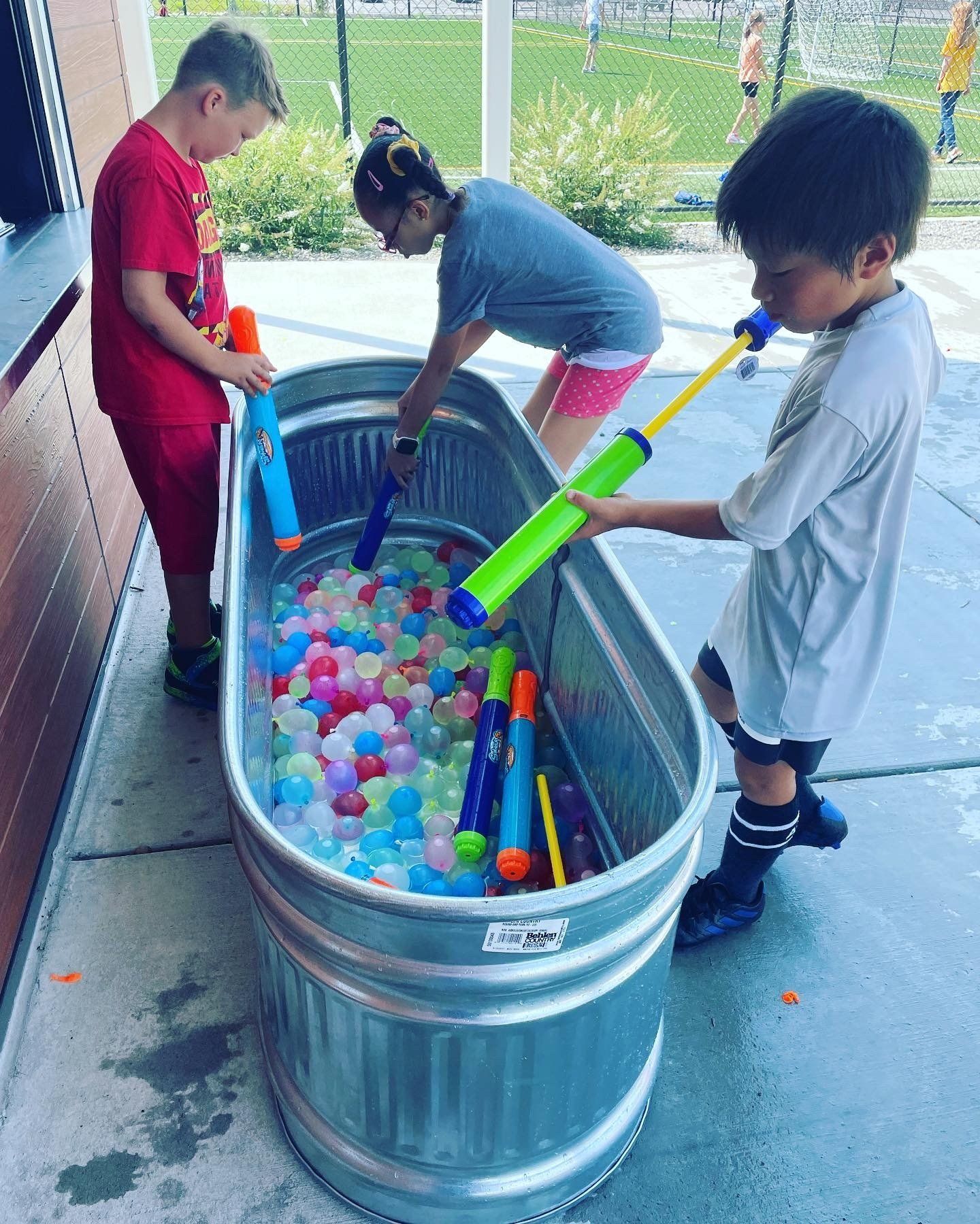 Kids and water balls