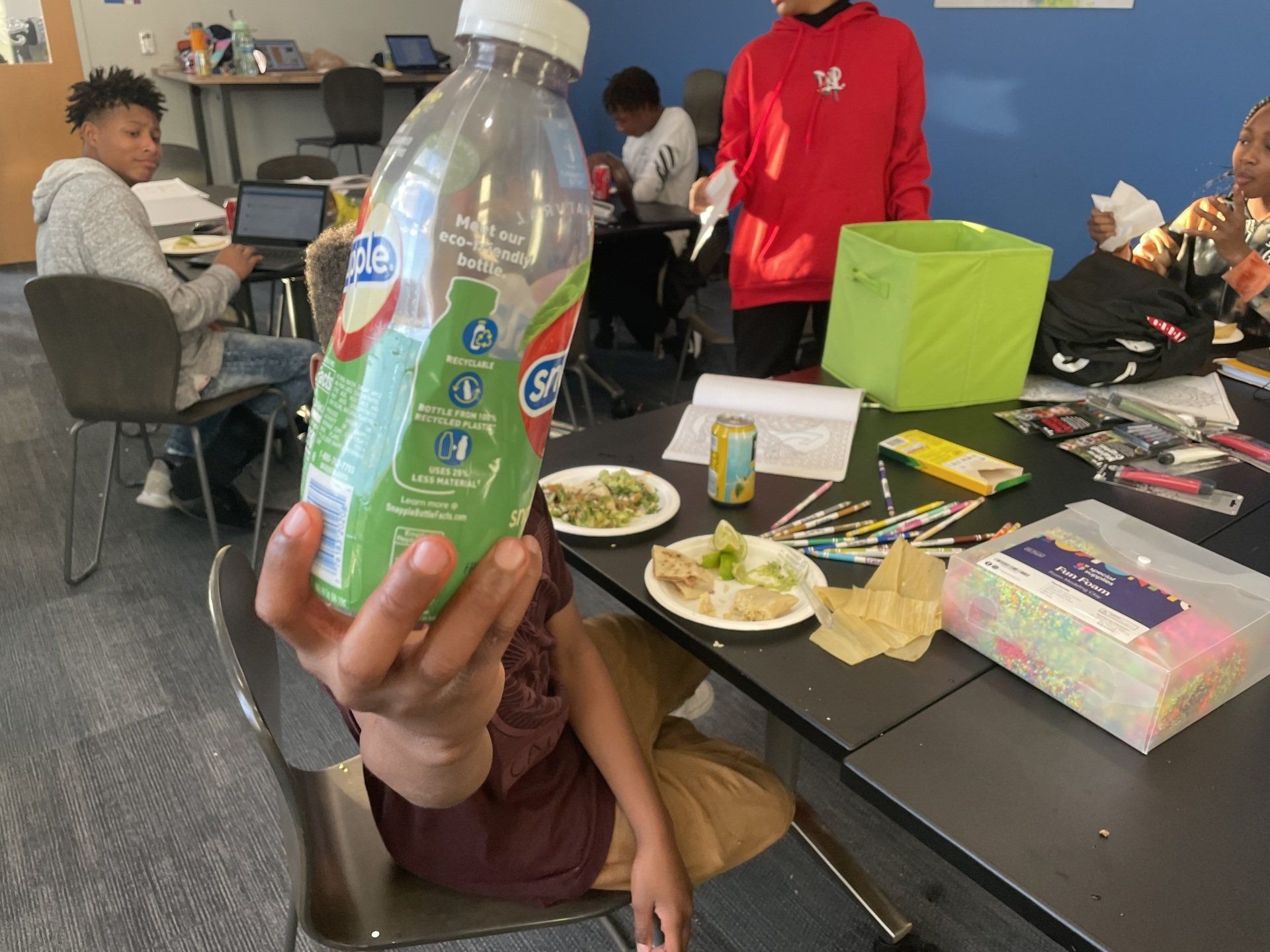 Hand holding a drink