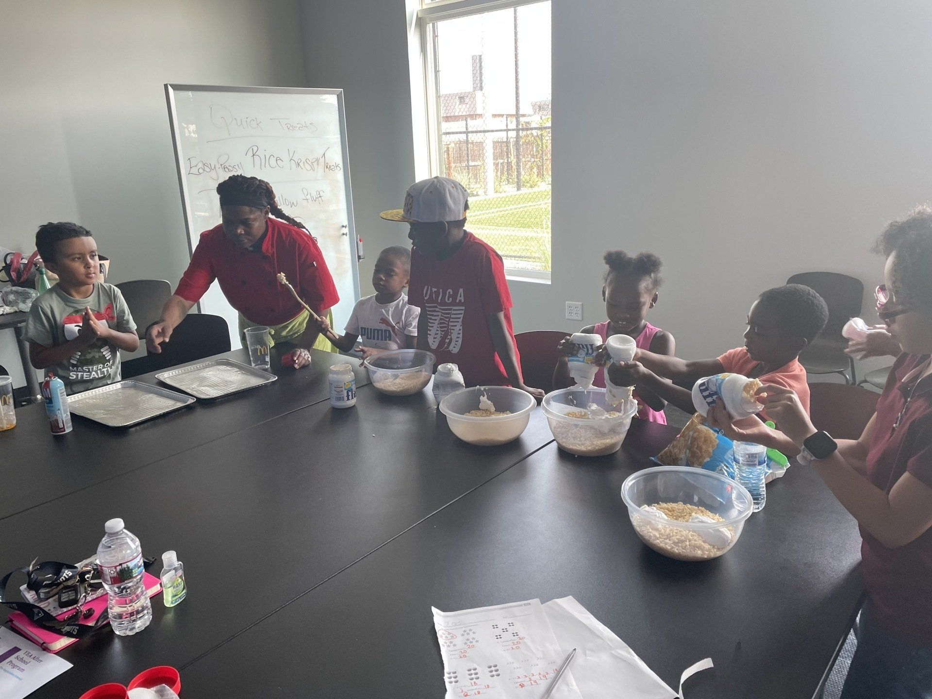 Kids making a dessert