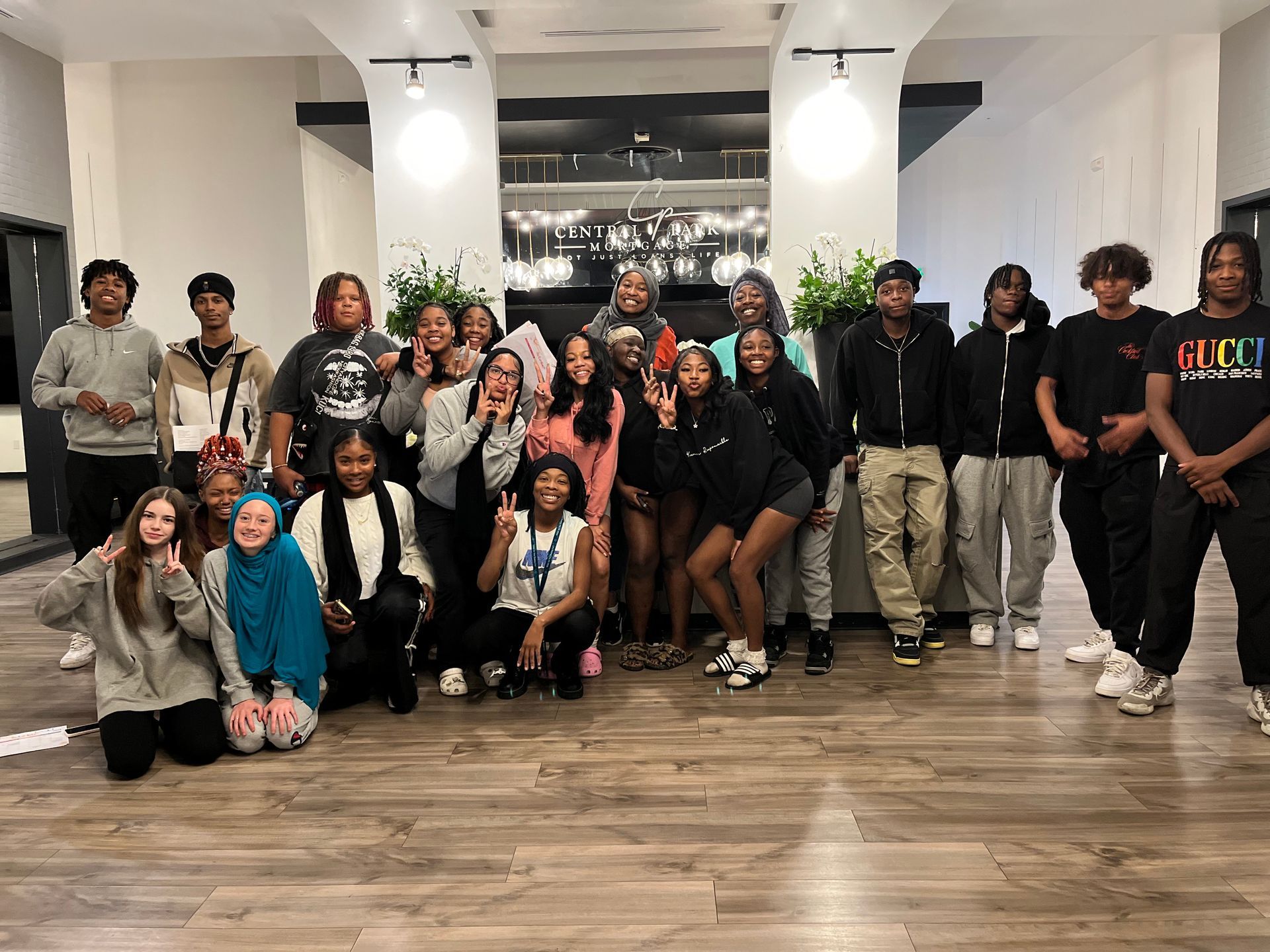 A group of people are posing for a picture together