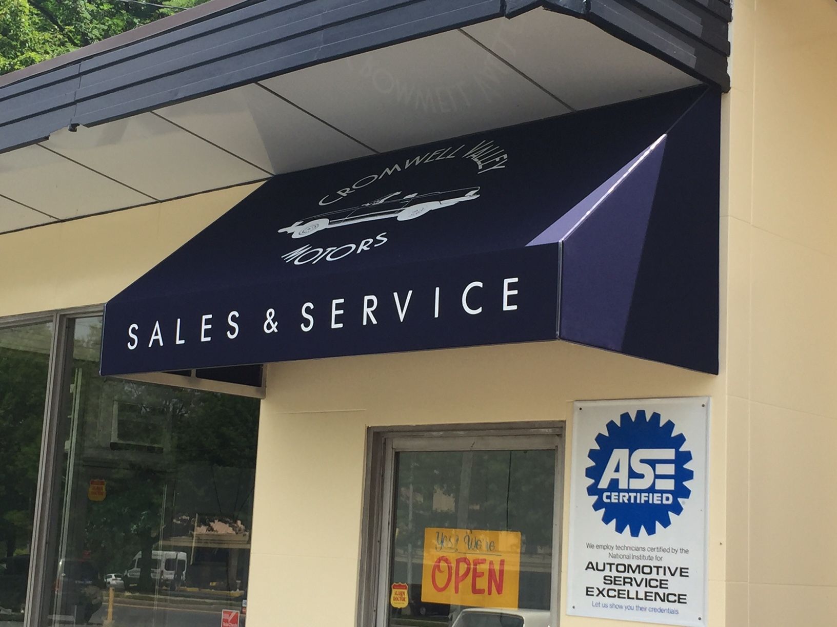 Blue awning over a business