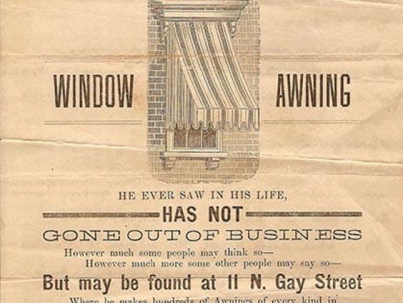 A poster that says window awning has not gone out of business