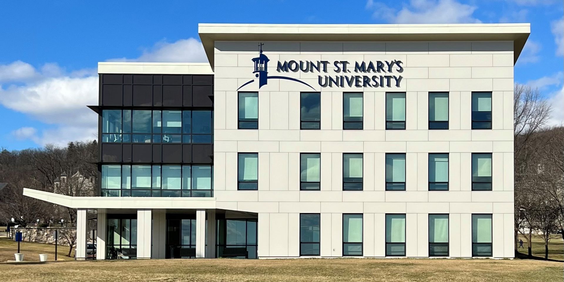 A large building with a sign that says mount st mary 's university