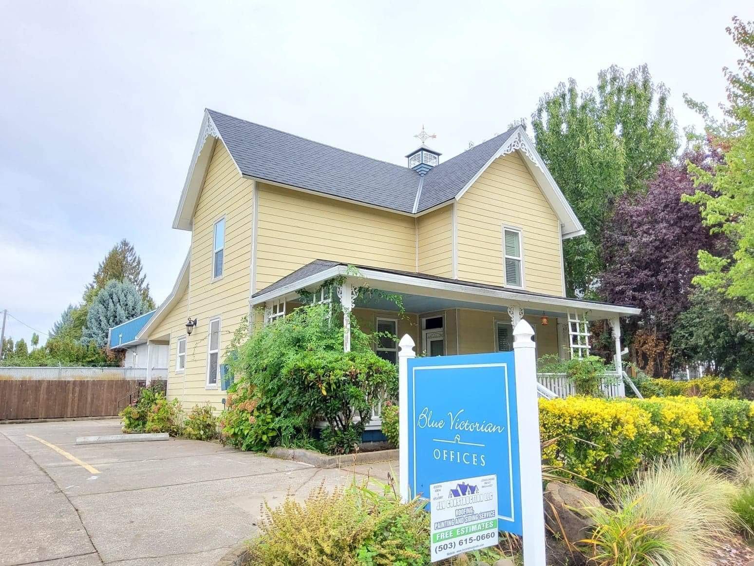 house with newly-installed yellow siding