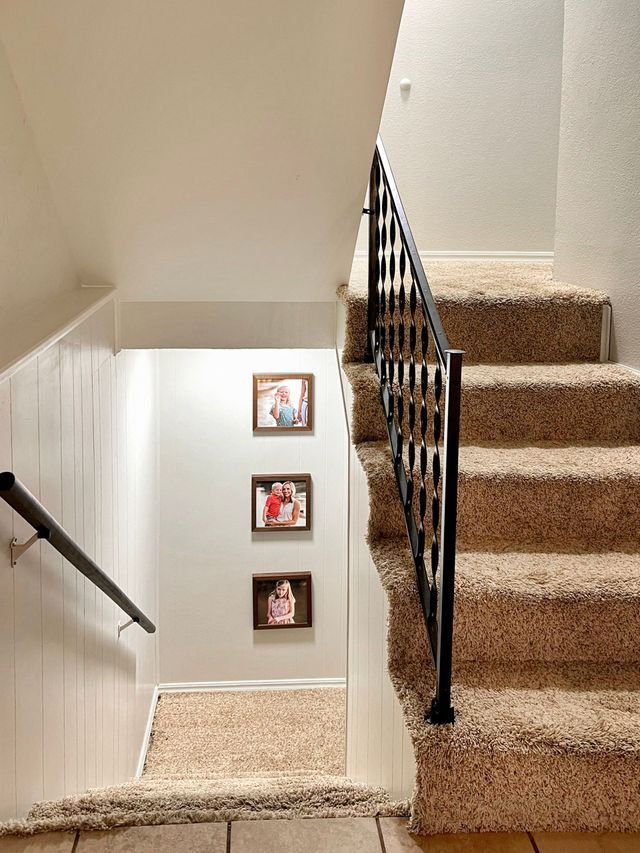 A set of stairs leading up to the second floor of a house
