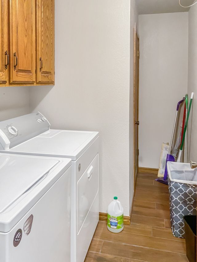 There is a washer and dryer in the laundry room.