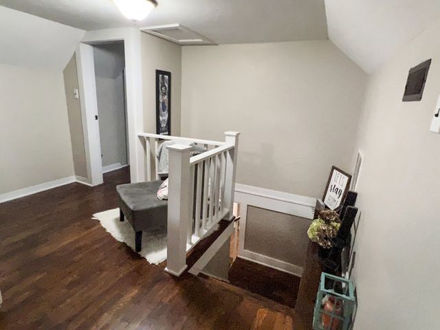 There is a staircase leading up to the second floor of a house.