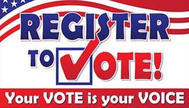 Red and blue “Register to Vote!” sign with a checkmark and the slogan “Your VOTE is your VOICE”