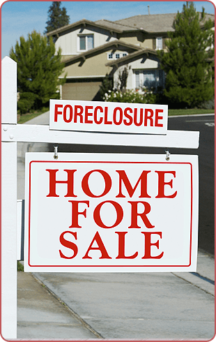 Home for sale sign in the street