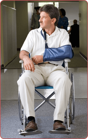 Man in wheel chair with hand injury